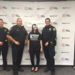 Binge Effects Event With Teenage Girl Posing With Officers For The Alcohol Liability Initiative Coalition